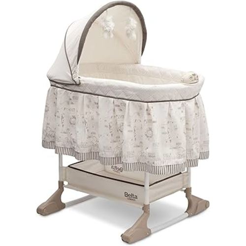 Delta Children Rocking Bedside Bassinet - Portable Crib with Lights Sounds and Vibrations, Play Time Jungle