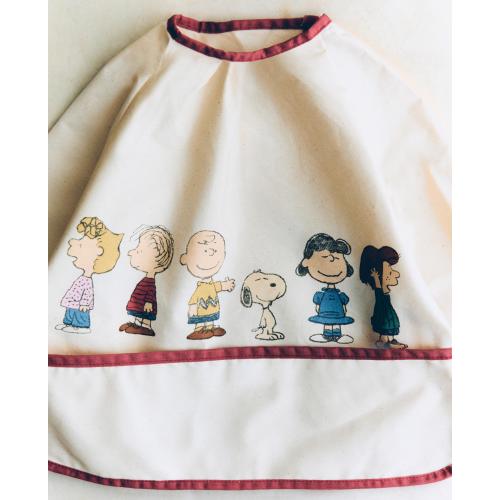 CHILDREN'S PEANUTS™ BIB WITH SLEEVES
