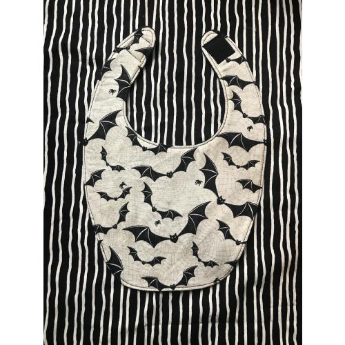 Black bats on white baby bib