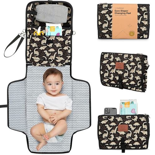 KeaBabies Portable Diaper Changing Pad - Large Waterproof Baby Changing Mat, Compact Travel Diaper Clutch, Functional Pockets Fit Newborn Essentials, Wipeable & Padded Baby Changer (Dino Ridge)