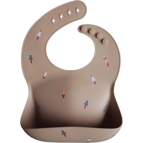 mushie Silicone Baby Bib | Adjustable Fit Waterproof Bibs (Rocket Ship)
