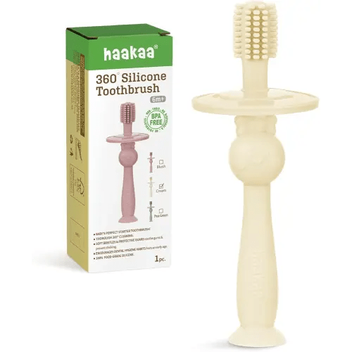 haakaa 360° Baby Toothbrush with Suction Base - Gentle Cleaning for Infant Self-Brushing Training, Food-Grade Silicone, Adjustable Safety Shield - Cream (1 Piece)