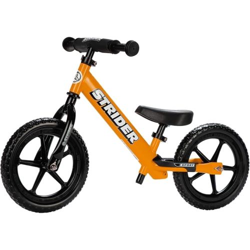 Strider 12” Sport Bike - No Pedal Balance Bicycle for Kids 1 to 4 Years - Includes Safety Pad, Padded Seat, Mini Grips & Flat-Free Tires - Tool-Free Assembly & Adjustments