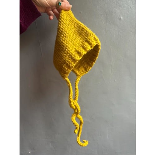 Knitted pixie baby bonnets