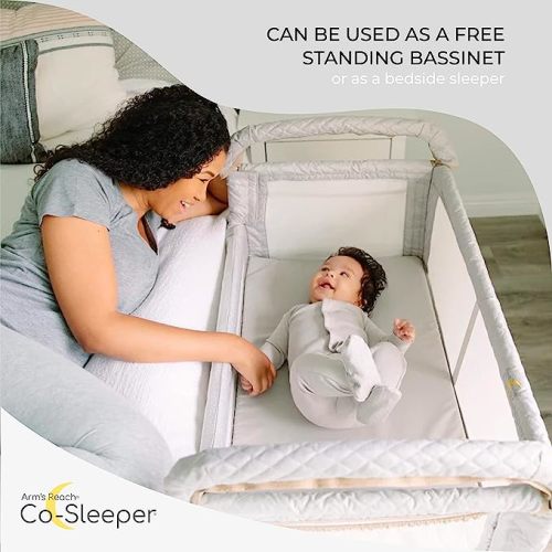 Arm’s Reach Clear-Vue Co-Sleeper Bedside Bassinet Featuring Clear Mesh Panels with Fold-Down Side, Large Attached Storage Basket, 4 Wheels, and Height-Adjustable Legs, White