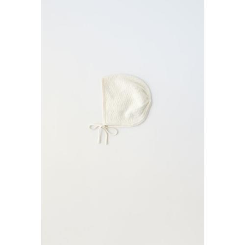 DETAILSOPEN KNIT COTTON SILK JUMPSUITSILK BLEND KNIT BONNETDETAILSSTRUCTURED KNIT COTTON SILK SET