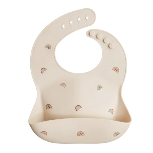 mushie Silicone Baby Bib | Adjustable Fit Waterproof Bibs (Rainbows)