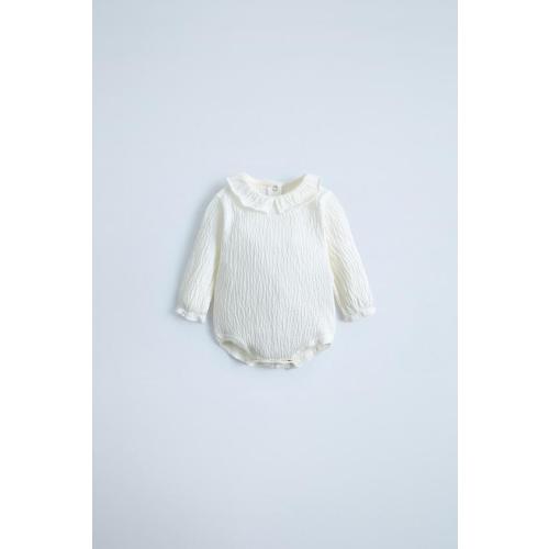 FLORAL EMBROIDERED PANTIESTEXTURED BODYSUIT WITH RUFFLEFOUR-PACK OF COLORFUL SOCKS