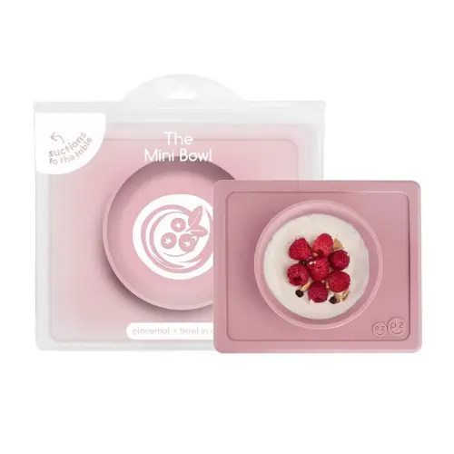 ezpz Mini Bowl for 12 Months+ (Blush) - 100% Silicone Suction Bowl with Built-in Placemat for Toddlers - Comes with a Reusable Travel Bag