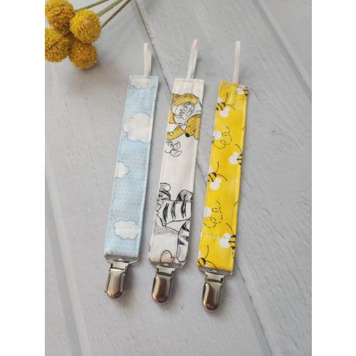 Winnie the pooh themed pacifier clip set