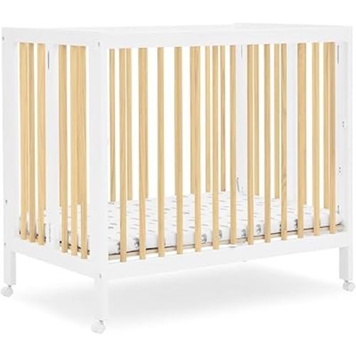 Delta Children Mia Portable Folding Mini Crib with 1.5-Inch Mattress - Greenguard Gold Certified, Bianca White/Natural