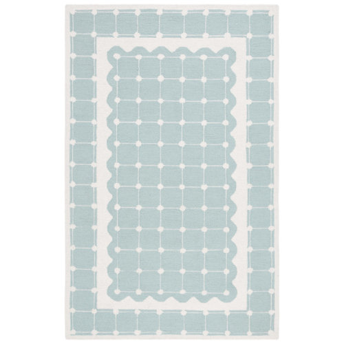 Darinesha Oriental Hand Tufted Wool/Cotton in Turquoise/White Area Rug