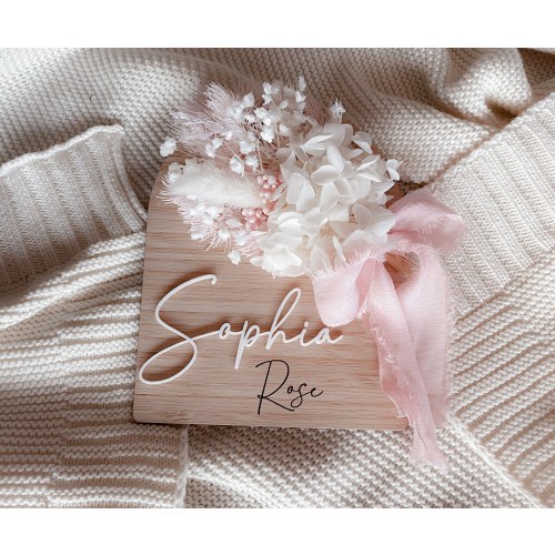 Wooden personalised name sign with dried flowers and ribbon