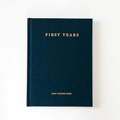 The Minimalist Baby Book. Age 0-5. Made in USA. 7x9.5". Sustainable Materials. Navy.
