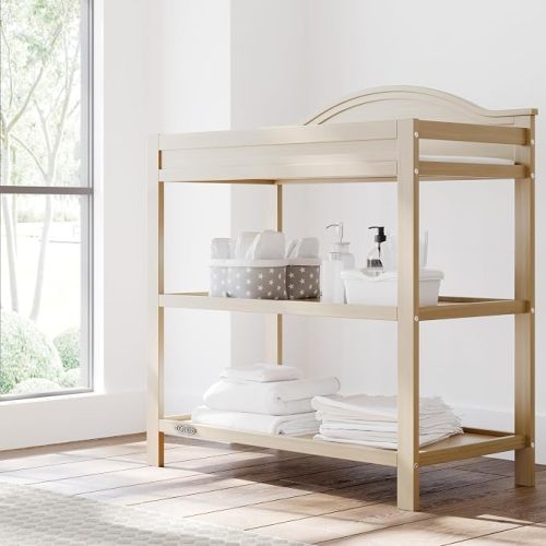 Graco Story Changing Table with Water-Resistant Pad, Driftwood | GREENGUARD Gold Certified Baby Changing Station with Safety Strap, 2 Open Shelves, Nursery Changing Table