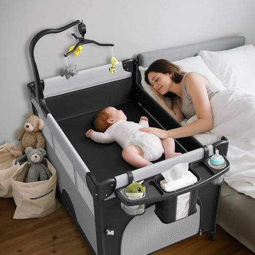 5 in 1 Pack and Play, Baby Bassinet Bedside Sleeper, Portable Baby Crib with Diaper Changer, Storage Rack& Music Box Toy Bar, Foldable Playard for Newborn Toddlers (Grey)