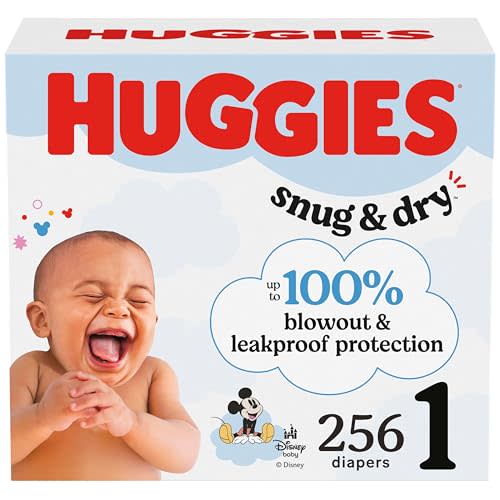 Huggies Size 1 Diapers, Snug & Dry Newborn Diapers, Size 1 (8-14 lbs), 256 Count (4 Packs of 64), Packaging May Vary