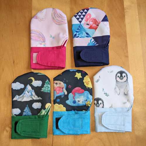 Waterproof infant teething or eczema mittens, cotton lined