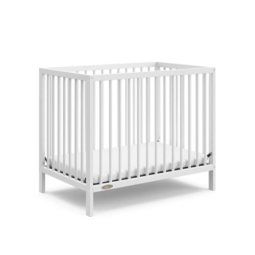Graco Teddi 4-in-1 Convertible Mini Crib with Bonus Water-Resistant Mattress (White) – GREENGUARD Gold Certified, 2.75-Inch Mattress Included, Convenient Size, Easy 30-Minute Assembly