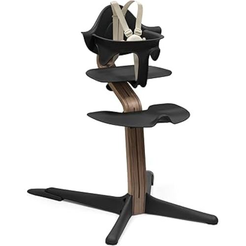 Stokke Nomi High Chair, Black/Walnut - Inspires Active Sitting - Tool-Free, Seamless Adjustability - Includes Baby Set with Removable Harness for Children 6-24 Months