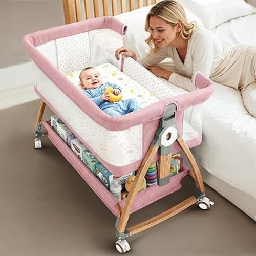 Earth&ME Bedside Bassinet for Baby – Portable Co-Sleeper Crib with Adjustable Height, Breathable Mesh Sides, Storage Basket, Mosquito Net (Wood Grain, Pink)