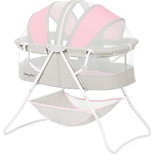 Dream On Me Karley Baby Bassinet in Grey and Pink, Lightweight Portable, Quick Fold and Easy to Carry , Adjustable Double Canopy, Indoor and Outdoor with Large Storage Basket.