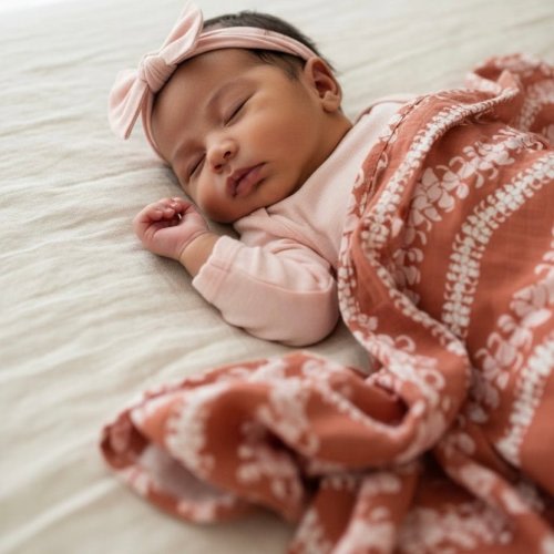Brick Puakenikeni Lei Swaddle Blanket