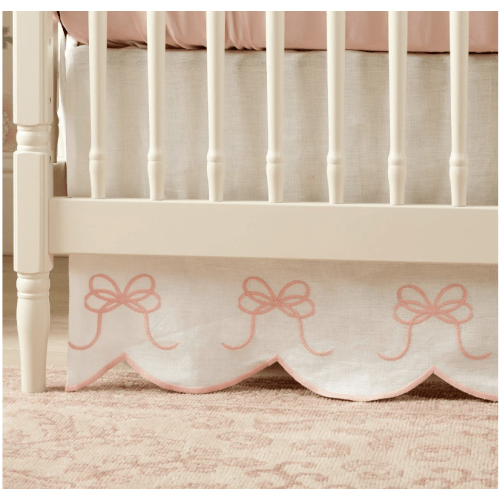 Bow Scalloped Crib Skirt in Petal Pink | Caitlin Wilson