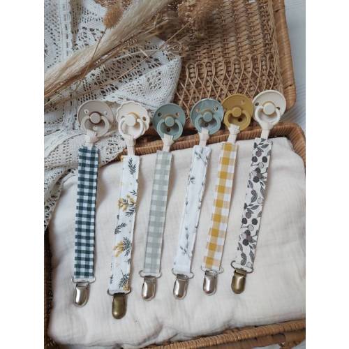 Green pacifier clips
