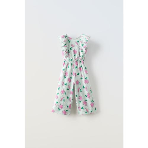 METALLIC SNEAKERSTEXTURED FLORAL JUMPSUITSEAMLESS RIB SHORT JUMPSUIT