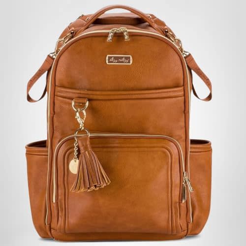 Itzy Ritzy Diaper Bag Backpack – Large Capacity Boss Plus Baby Backpack Diaper Bag Featuring 19 Pockets, Changing Pad, Stroller Clips, and Comfortable Straps (Cognac)