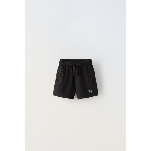 LABEL TRIM PLUSH SHORTS