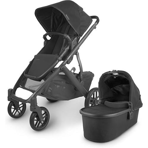 UPPAbaby Vista V2 Stroller / Convertible Single-To-Double System / Bassinet, Toddler Seat, Bug Shield, Rain Shield, and Storage Bag Included / Jake (Charcoal/Carbon Frame/Black Leather)