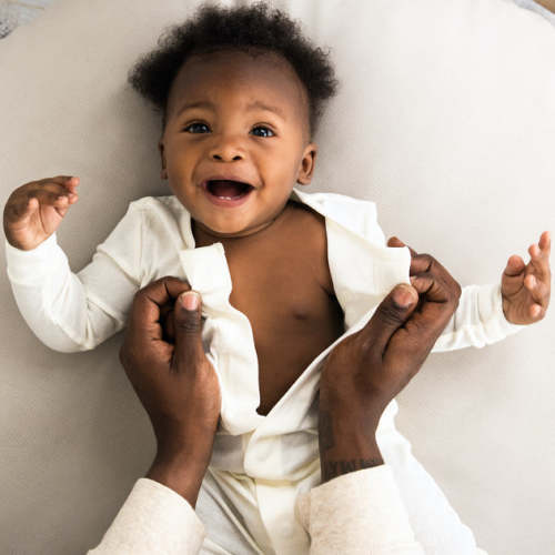 cream organic cotton magnetic footie 6-9MO