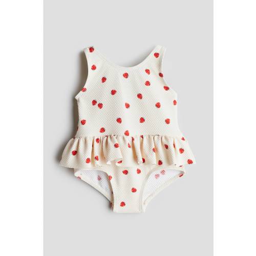 SWIMSUIT WITH FLOUNCE