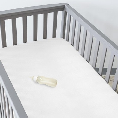 Breathable Waterproof White Crib Mattress Protector by Bare Home