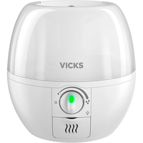 Vicks 3-in-1 SleepyTime Humidifier, No. 1 Brand Recommended by Pediatricians*. Cool Mist Humidifier with Night-Light, and Essential Oil Diffuser for Baby and Kids rooms. Visible Cool Mist, White.