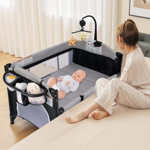 OLAKIDS Baby Bedside Sleeper with Bassinet, Diaper Changer, Mattress, Carry Bag, Music Box & Hanging Toys, Foldable Bedside Crib, Portable Playard for Newborn Toddlers