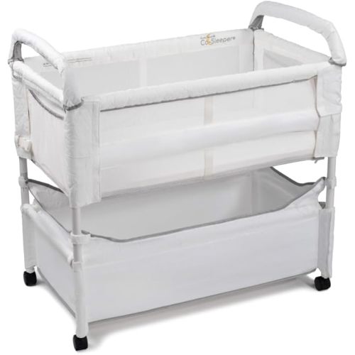Arm’s Reach Clear-Vue Co-Sleeper Bedside Bassinet Featuring Clear Mesh Panels with Fold-Down Side, Large Attached Storage Basket, 4 Wheels, and Height-Adjustable Legs, White