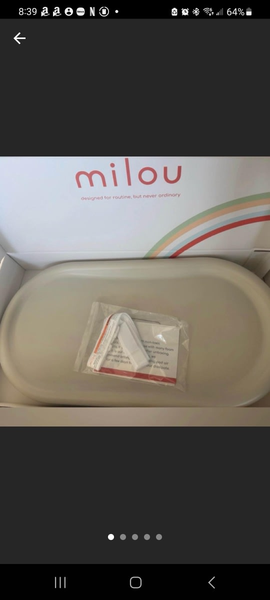 Minlou changing pad with removable straps...