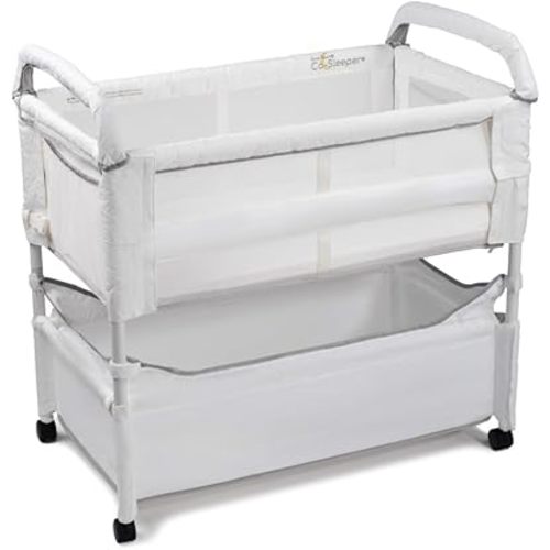 Arm’s Reach Clear-Vue Co-Sleeper Bedside Bassinet Featuring Clear Mesh Panels with Fold-Down Side, Large Attached Storage Basket, 4 Wheels, and Height-Adjustable Legs, White