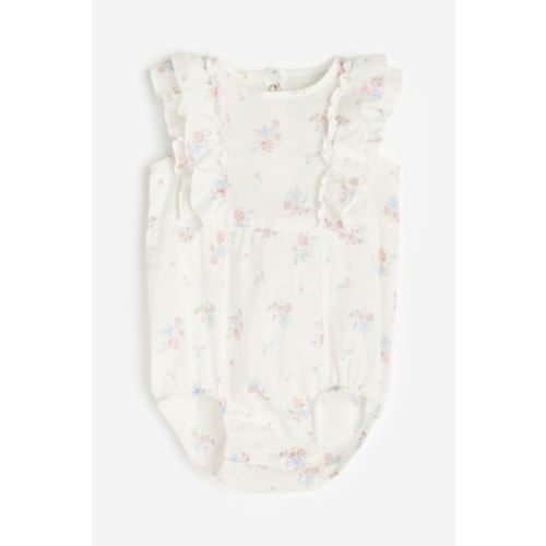 Flounce-trimmed romper suit