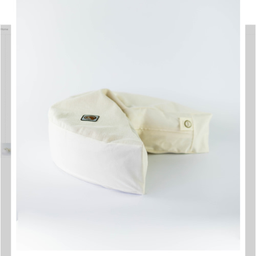 organic nesting pillow in vanilla bean