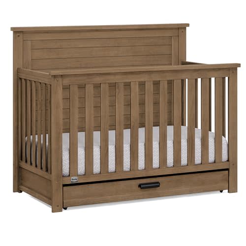 Delta Children Simmons Kids Caden 6-in-1 Convertible Crib with Trundle Drawer, Greenguard Gold Certified, Aged Oak