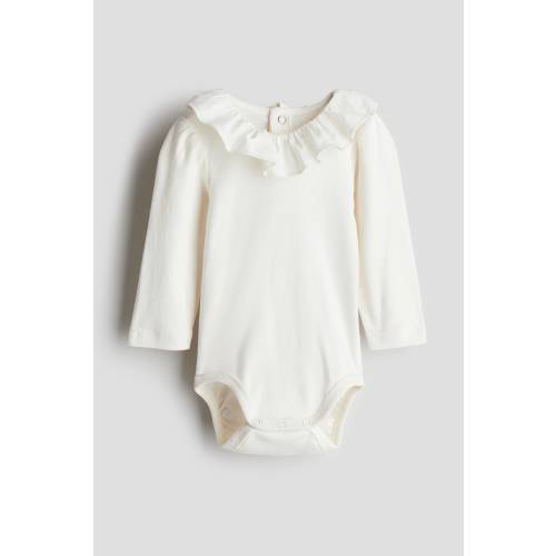 BODYSUIT WITH RUFFLE COLLAR