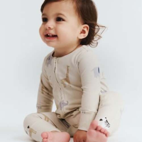 The Short Sleeve Zip Romper License