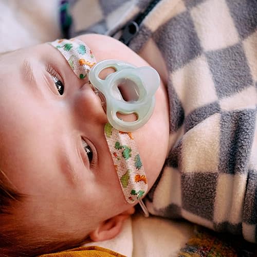Tommee Tippee Ultra-Light Silicone Pacifier, 0-6 Months, Symmetrical One-Piece Design, BPA-Free Silicone Binkies, Clear/Green/Pink, Pack of 4