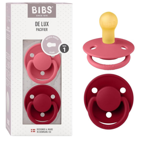 Size 1 BIBS De Lux Baby Pacifier 2-Pack | Made in Denmark | BPA Free Dummy Soother, Round Nipple. Natural Rubber Latex, Size 1 (0-6 Months), Coral/Ruby