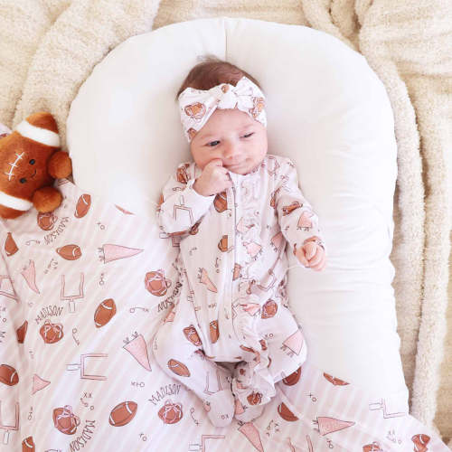 Tiny Touchdowns Ruffle Zipper Footie | Pink