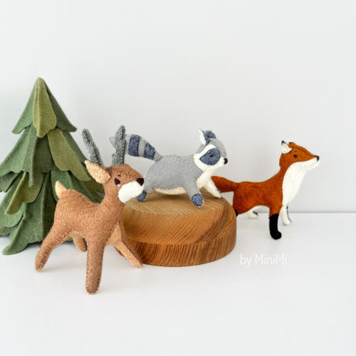 Soft felt woodland animal toy set with a deer, fox, raccoon, fir tree, bear